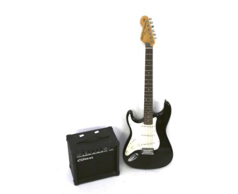 An Encore 'Blaster' series left handed electric guitar and amp. The guitar in black and white, L97cm, the amplifier a C. Gian