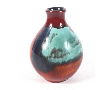 A 20th century Poole pottery Collectors Club 'Living Glaze' pottery vase. Predominately decorated in green, orange, blue and 