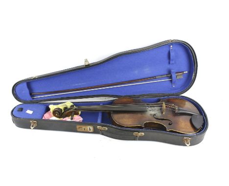 A vintage violin, bow and case. Violin 60cm long