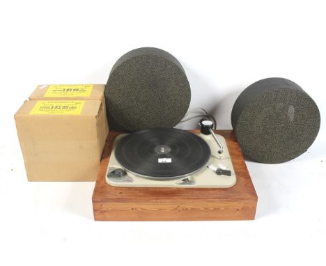A vintage/retro Thorens record deck turntable and speakers. Model TD135 s/n. 26069, Thorens tone arm and a Golding cartridge.