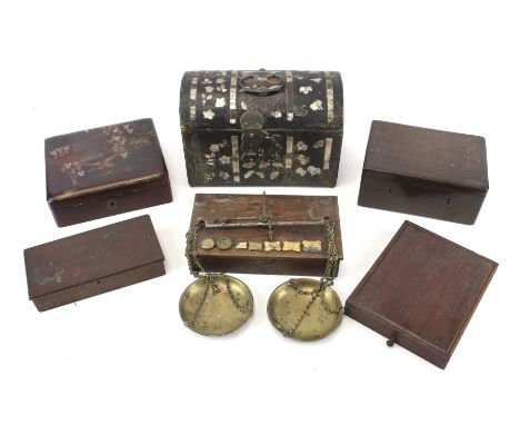 A group of six assorted wooden boxes. Including inlaid mother of pearl example in the shape of a trunk, etc. Max. H15.5cm
