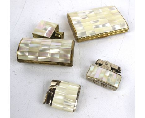 A selection of mother of pearl smoking sets. Including a snuff box, two Ronson lighters, etc. Max L9cm