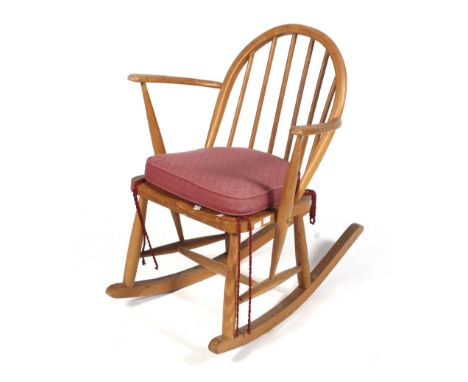 A vintage Ercol child's bentwood rocking chair. H74cm