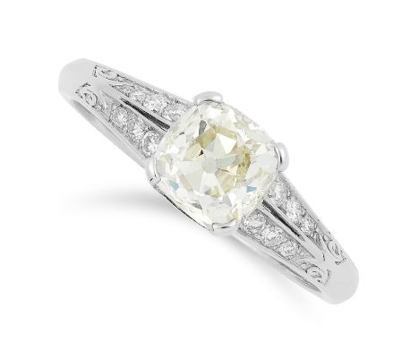 1.35 CARAT DIAMOND RING set with a cushion cut diamond of approximately 1.35 carats with further round cut diamonds to the sh