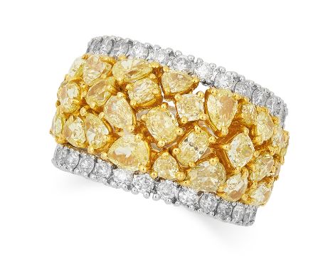 3.50 CARAT YELLOW DIAMOND DRESS RING set with oval, pear and cushion cut yellow diamonds in a border of round cut diamonds, s