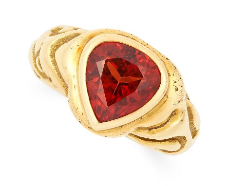 SPESSARTITE GARNET DRESS RING, ELIZABETH GAGE, 1989 set with a pear cut spessartite garnet with engraved detailing to the sha