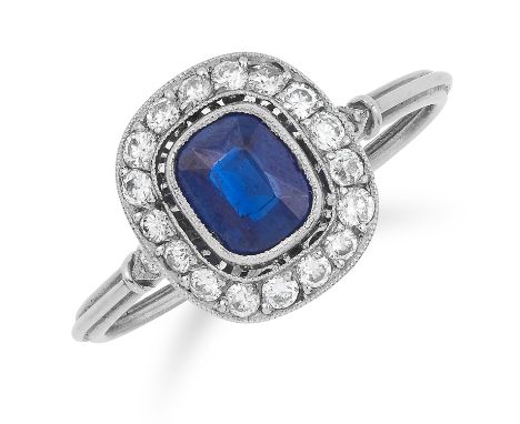 ART DECO SAPPHIRE AND DIAMOND CLUSTER RING set with a cushion cut sapphire in a border of round cut diamonds, size N / 7, 2.9