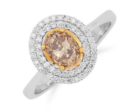CHAMPAGNE DIAMOND CLUSTER RING set with an oval cut champagne diamond of approximately 1.00 carats in a cluster of round cut 