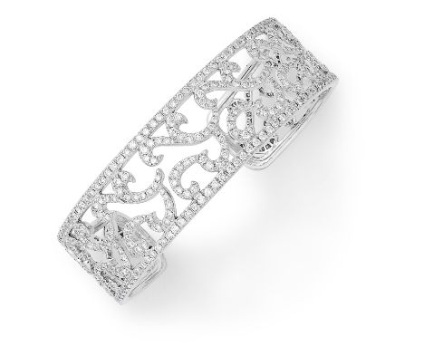 DIAMOND BANGLE the open framework is set with round cut diamonds, 5.5cm, 31g.