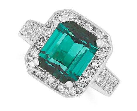 2.50 CARAT TOURMALINE AND DIAMOND RING set with an emerald cut tourmaline of approximately 2.50 carats in a border of round c