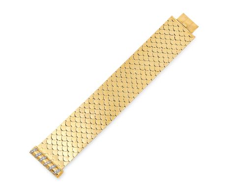 VINTAGE DIAMOND BRACELET comprising of an articulated gold bracelet set with round cut diamonds to the clasp, 18.5cm, 117.5g.