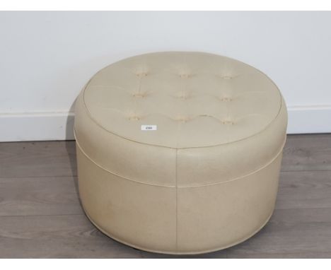 LEATHER POUFFE ON CASTERS 58 X 35 CM