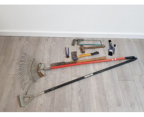 COLLECTION OF VINTAGE TOOLS INCLUDES RAKE, AXE AND SAW ETC