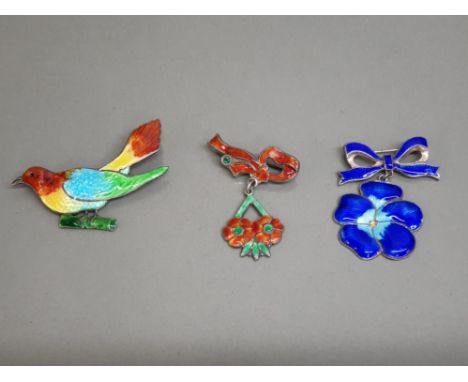 3 SILVER AND ENAMEL BROOCHES INCLUDES 2 FLORAL AND 1 BIRD BROOCH, ALL MARKED AS SILVER. BIRD ALSO MARKED H.G.W. 22.7 GRAMS GR