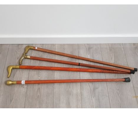 4 BRASS HANDLED WALKING STICKS INCLUDING DOG, DUCK AND COMPASS