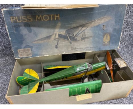 A flying scale model of the De Havilland 80A (Puss Moth) 3 seat cabin monoplane, with original box