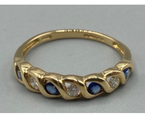 Ladies 18ct yellow gold sapphire and diamond band size K 1.7g gross