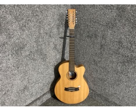 An acoustic guitar by Tanglewood