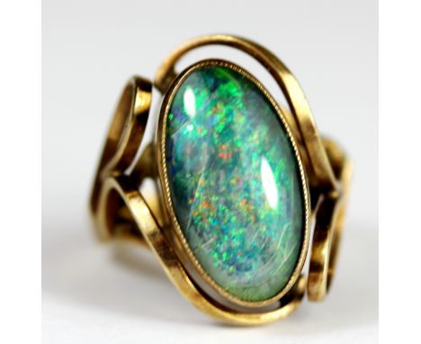 An antique 9ct yellow gold (worn stamp 9ct) opal doublet set ring, (K).