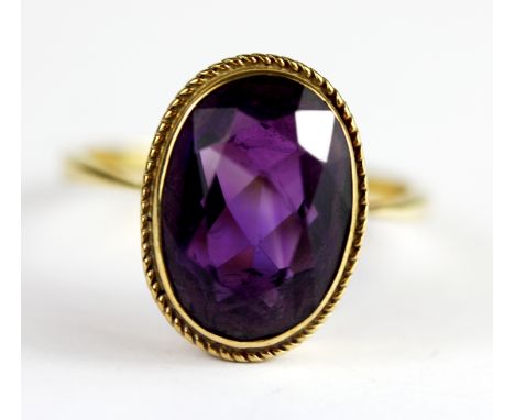 A 9ct yellow gold amethyst set ring, (R).