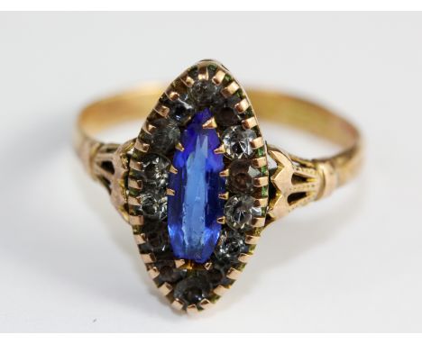 An antique 9ct stone set marquise shaped cluster ring, (O).