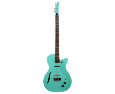 Danelectro 56 Vintage baritone guitar, made in Korea, ser. no. 0xxxx8; Finish: dark aqua; Fretboard: rosewood; Frets: good; E