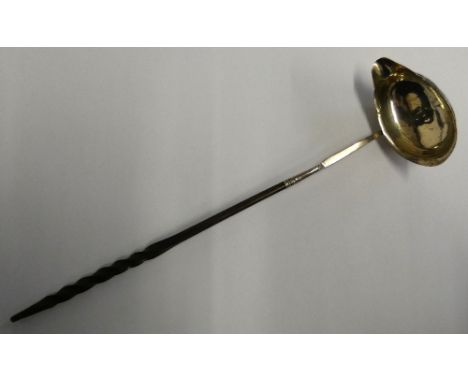 A Georgian silver toddy ladle, London 1793 with whalebone handle