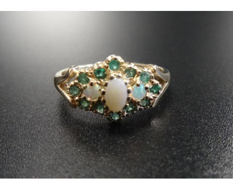 OPAL AND EMERALD CLUSTER RINGthe three central opals in emerald surround, on nine carat gold shank, ring size L-M 