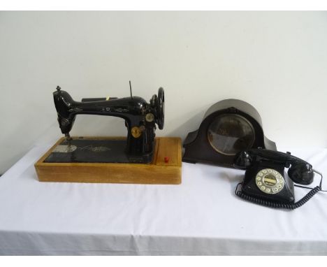 MIXED LOT OF COLLECTABLESincluding a Singer sewing machine numbered Y5104969, a Bush Savoy telephone of traditional design  w
