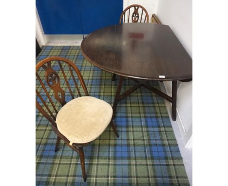 ERCOL STAINED OAK DINING TABLEwith shaped drop flaps, standing on splayed supports united by an X stretcher, 114cm wide, toge