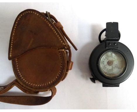 WWII BRITISH MKIII MILITARY COMPASSmarked 'T.G.Co.Ltd. London No.B168839', with War Department arrow and dated 1942, with mak