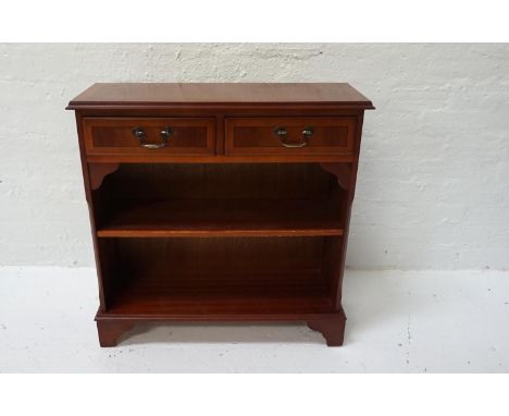 YEW AND CROSSBANDED SIDE CABINETwith a moulded top above two frieze drawers and an adjustable shelf below, standing on bracke