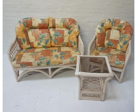 SUITE OF WHITE WICKER CONSERVATORY FURNITUREcomprising a two seat sofa with lattice work back and arms and two similar armcha