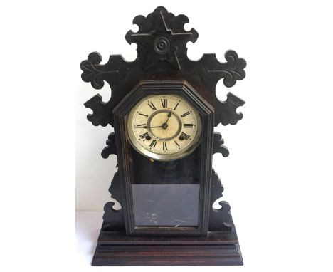THE ANSONIA CLOCK COMPANY OF NEW YORK MAHOGANY MANTEL CLOCKcontained in a shaped case with a glazed door opening to reveal a 
