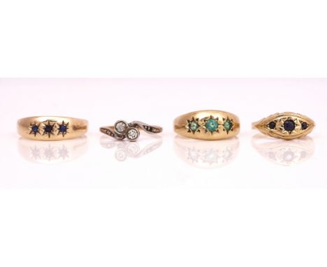 THREE GOLD AND GEM SET RINGS AND ANOTHER RING (4)Comprising; a 9ct gold and sapphire three stone ring, Edinburgh 1982, ring s