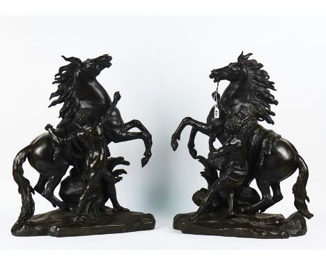 A PAIR OF PATINATED BRONZE MARLY HORSESLate 19th Century63cm highCondition report:- One lacking the mouth chain- Some chips, 