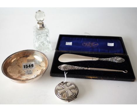 A SILVER PYX AND THREE FURTHER ITEMS (4)The circular hinge lidded pyx with a cruciform motif to the lid, London 1927, a circu