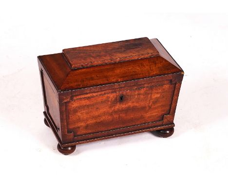 A REGENCY MAHOGANY SARCOPHAGUS TEA CADDYWith twin lidded interior, 27cm wide; 20cm high