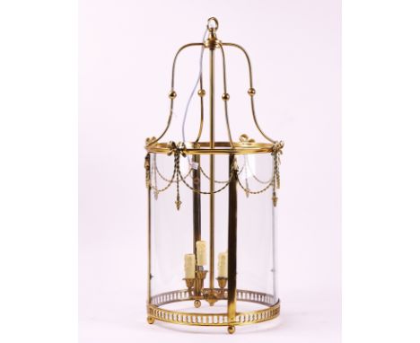 A POLISHED BRASS CYLINDRICAL HALL LANTERNModernWith a four-light suspension, 82cm high&nbsp;Condition report:&nbsp;Fitted for
