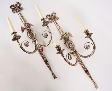 A PAIR OF SILVERED-METAL GEORGE III STYLE  TWIN LIGHT WALL APPLIQUÉS (2)Modern70cm high (2)Condition report:&nbsp;Some tarnis