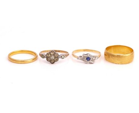 FOUR RINGS (4)Comprising; a 22ct gold wide band wedding ring, Birmingham 1901, ring size M, 5.3 gms, a 22ct gold wedding ring