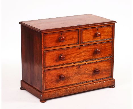 A VICTORIAN MAHOGANY CHESTWith two short over over two long drawers, 100cm wide; 80cm highOld marks and scratches all over th