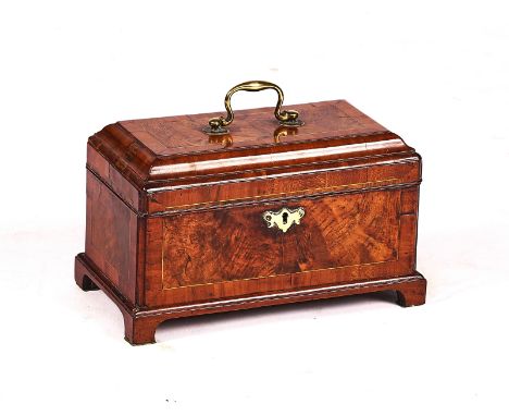 A MID-18TH CENTURY INLAID FIGURED WALNUT CADDY TOPPED BOXOn bracket feet, 31cm wide; 18cm high