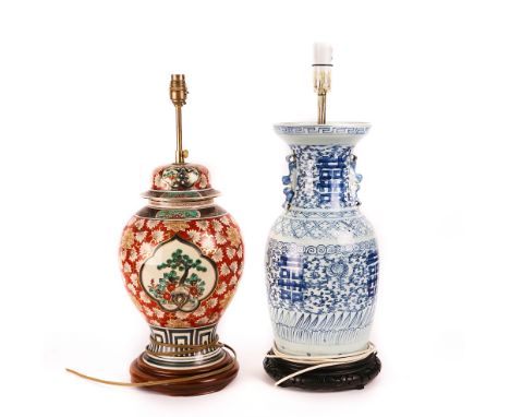 A CHINESE STYLE BLUE &amp; WHITE BALUSTER TABLE LAMP AND THREE OTHERS (4)20th CenturyA Chinese style blue and white porcelain