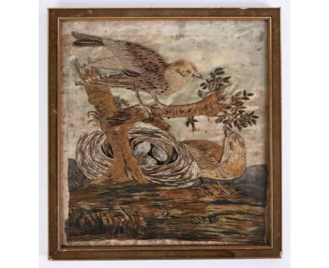 AN ENGLISH SILK WORK EMBROIDERED PICTURE OF A NESTING BIRDSFirst half 19th CenturyPossibly depicting two skylarks, later fram