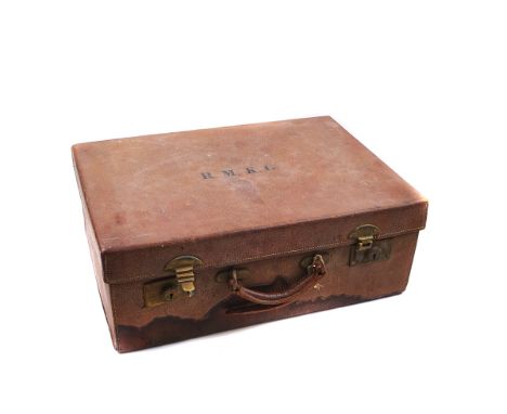 A SILVER MOUNTED TRAVELLING PART TOILET SETThe rectangular pig skin fitted case containing various silver lidded glass toilet