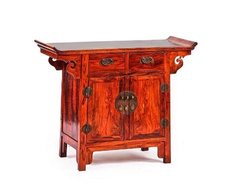 A 20TH CENTURY CHINESE HUALI SIDE CABINETWith a pair of drawers over cupboards, on shaped block feet, 105cm wide; 84cm highCo