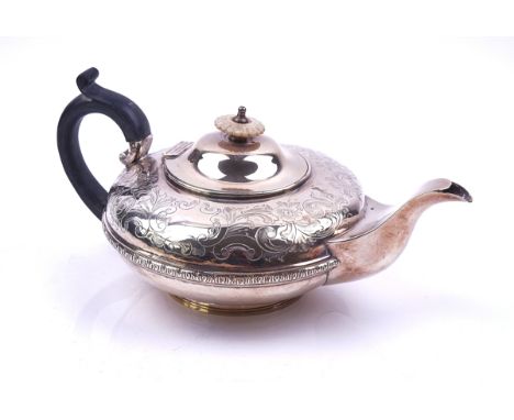 A WILLIAM IV SILVER TEAPOTOf compressed circular form with later floral, foliate and scroll engraved decoration, with a repla