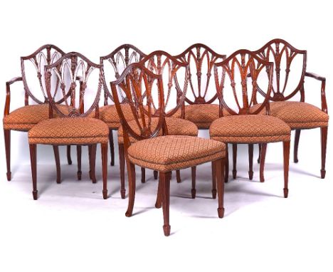 A SET OF EIGHT HEPPLEWHITE STYLE MAHOGANY DINING CHAIRSWith shield backs to include pair of carvers (8)Condition Report: One 