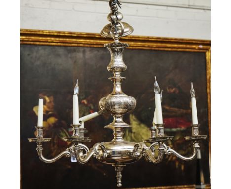 A QUEEN ANNE STYLE SILVERED-METAL SIX LIGHT CHANDELIER20th CenturyThe baluster stem and scroll branches with engraved leaf de
